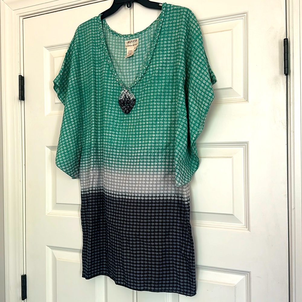 M.S.S.P. Dress size medium with wide sleeves. Teal and Navy patterned.